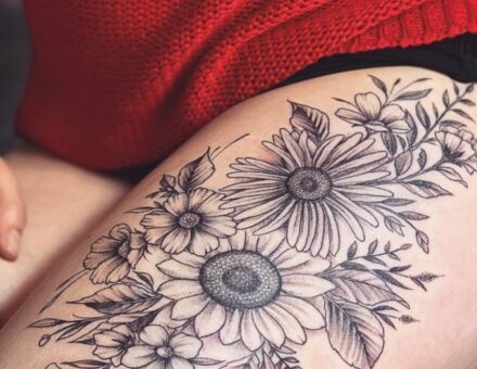 flower tattoos on thigh and hip